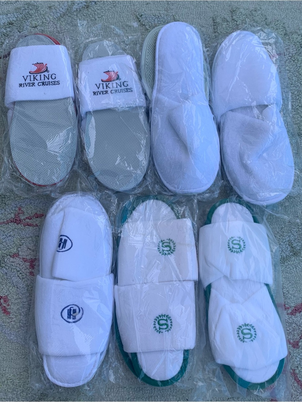 Bundle of 7 reusable white spa slippers